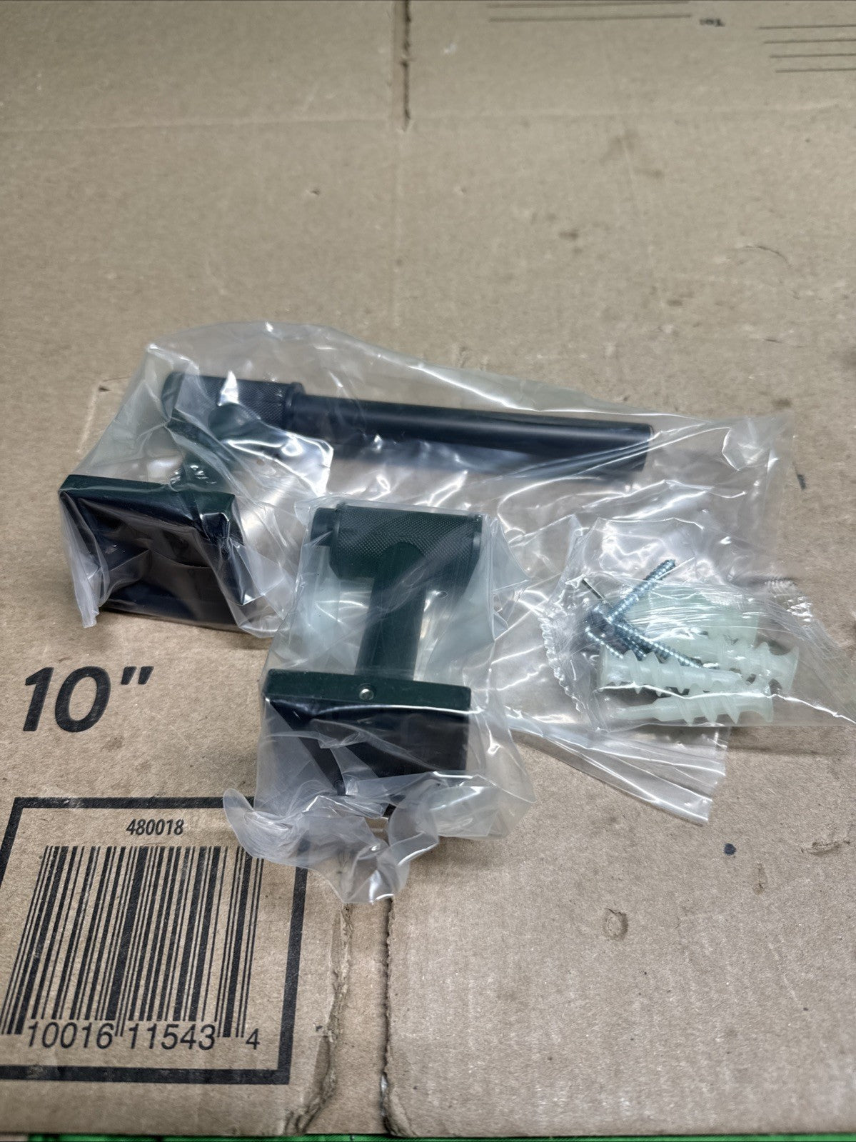 Delta Averland Wall Mount Pivot Arm Toilet Paper Holder in Matte Black