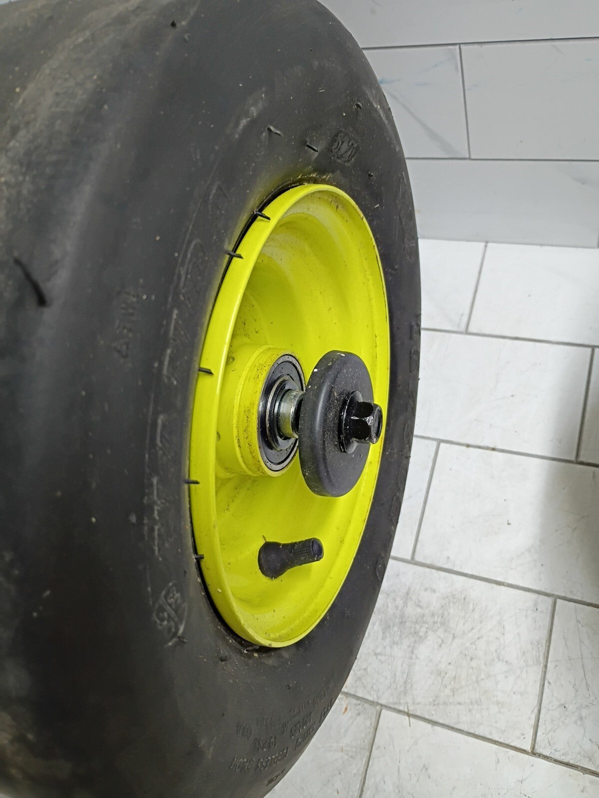 Front Wheel with Tire for Ryobi Z42Li 80v Zero Turn Mower + Axel & Spacers Used