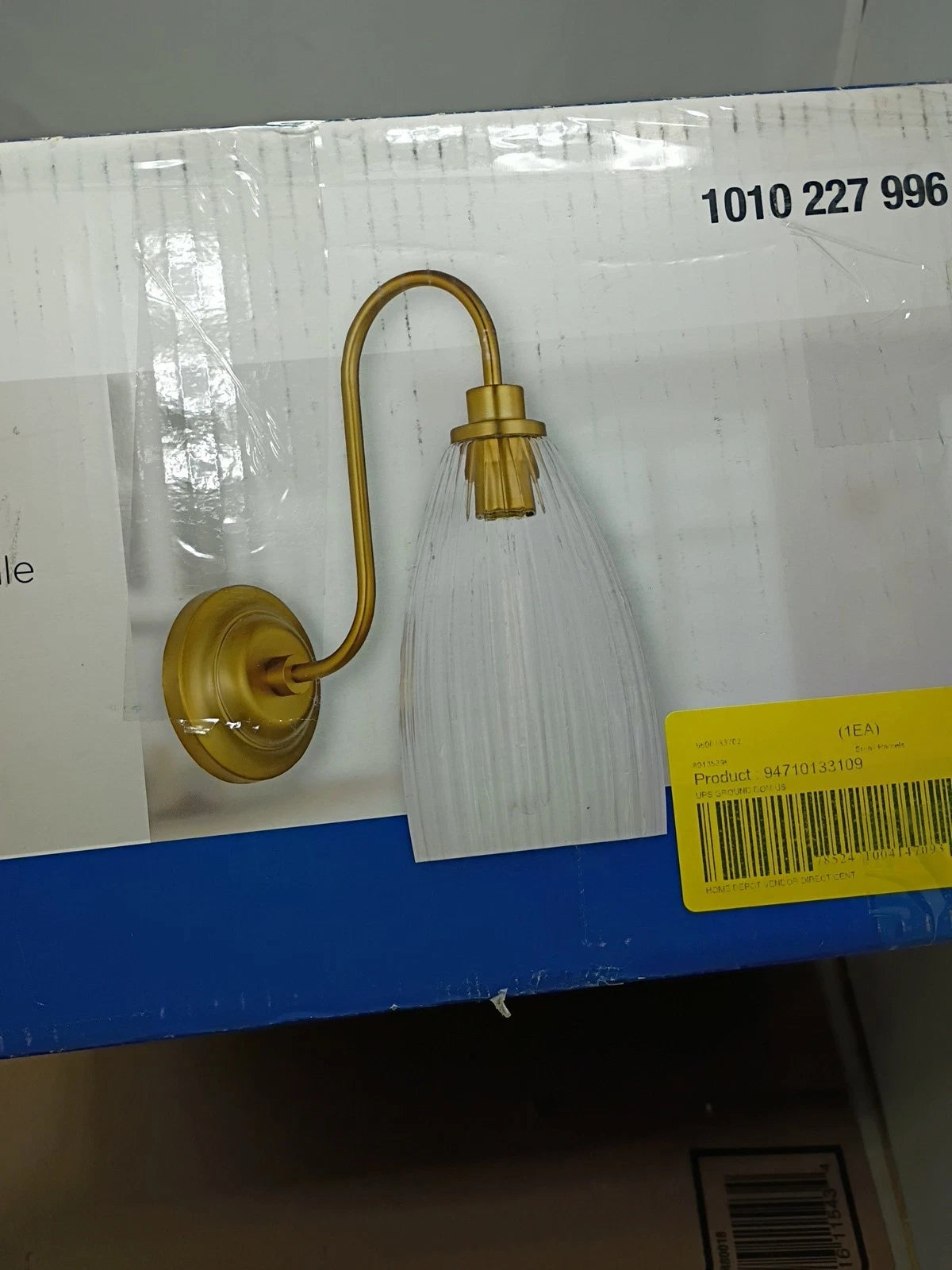 Progress Lighting Cely 14" 1-Light Brushed Bronze Wall Sconce Ribbed Glass Shade