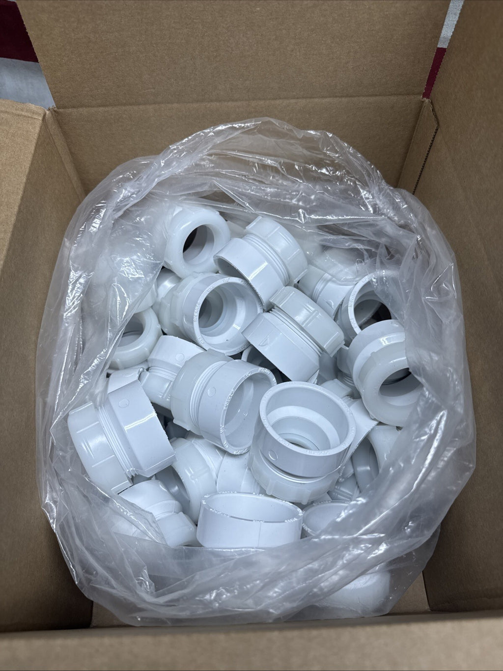 50-PK  1-1/2" x 1-1/4" PVC DWV Female Trap Adapter w/ Nut Socket x Tubular Slip