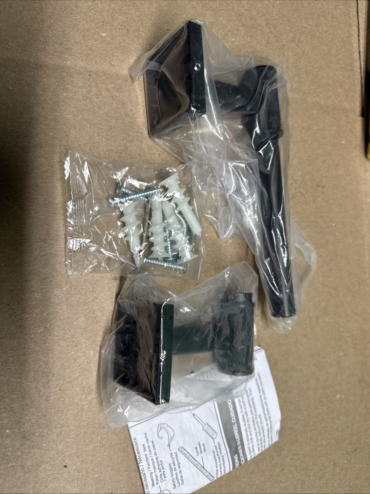 Delta Averland Wall Mount Pivot Arm Toilet Paper Holder in Matte Black