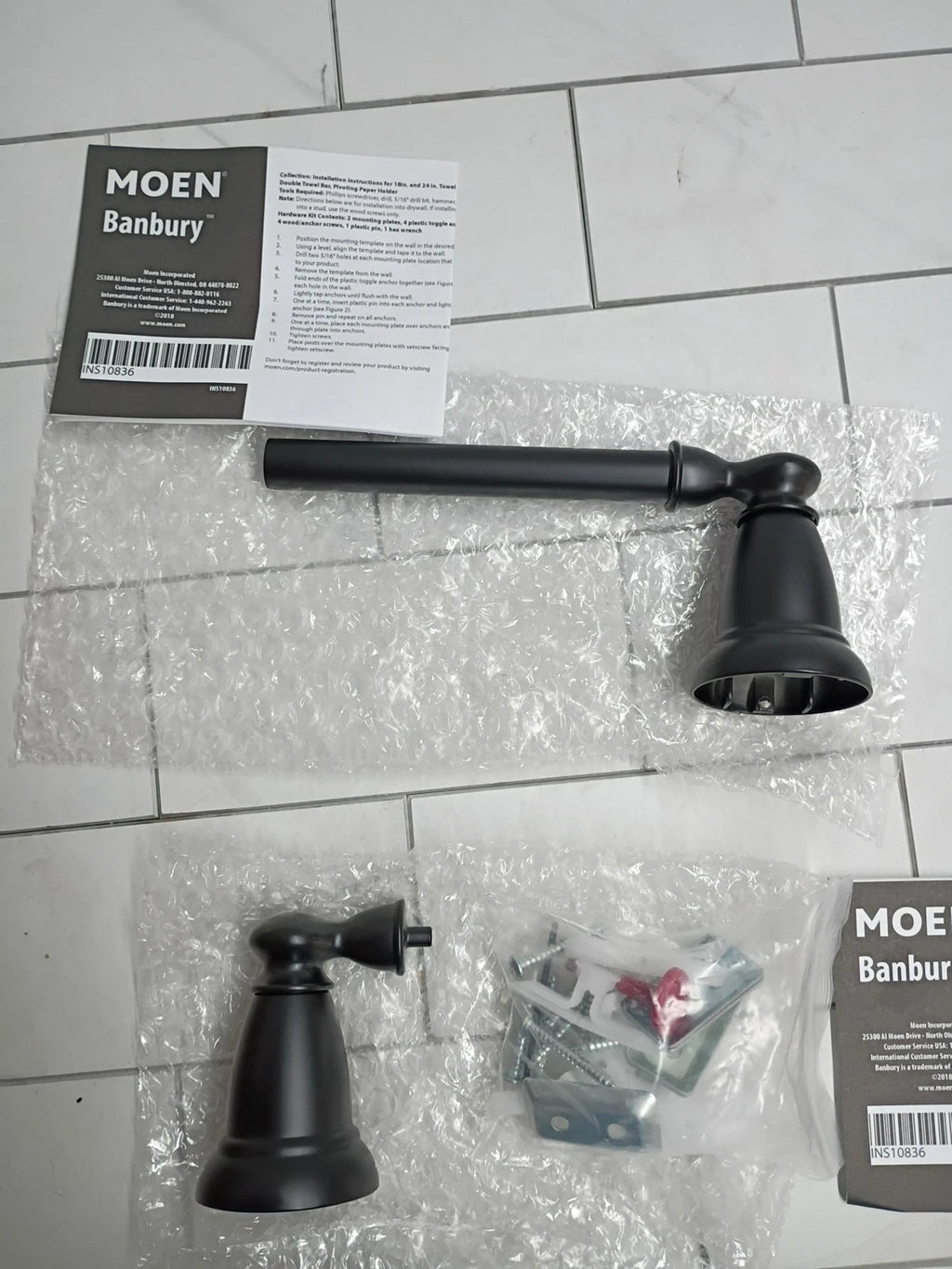 MOEN Y2608BL Banbury Pivoting Double Post Toilet Paper Holder in Matte Black OB