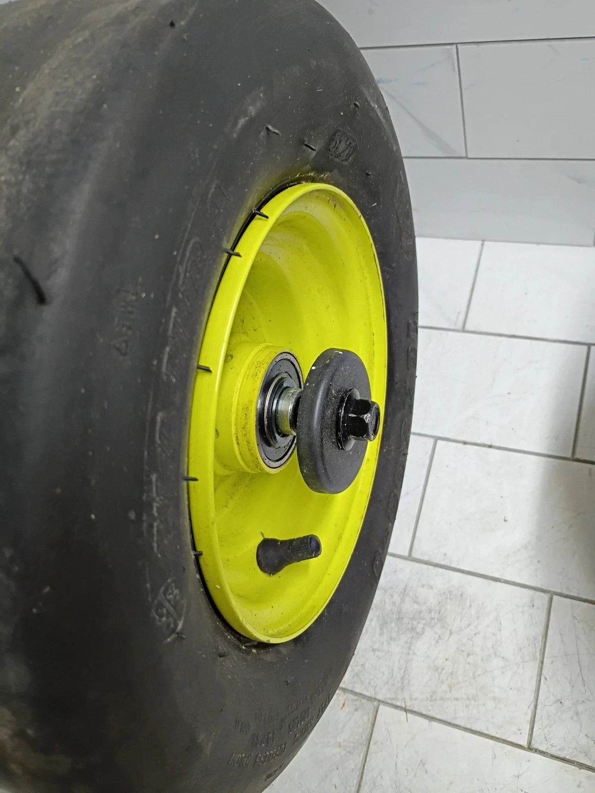 Front Wheel with Tire for Ryobi Z42Li 80v Zero Turn Mower + Axel & Spacers Used