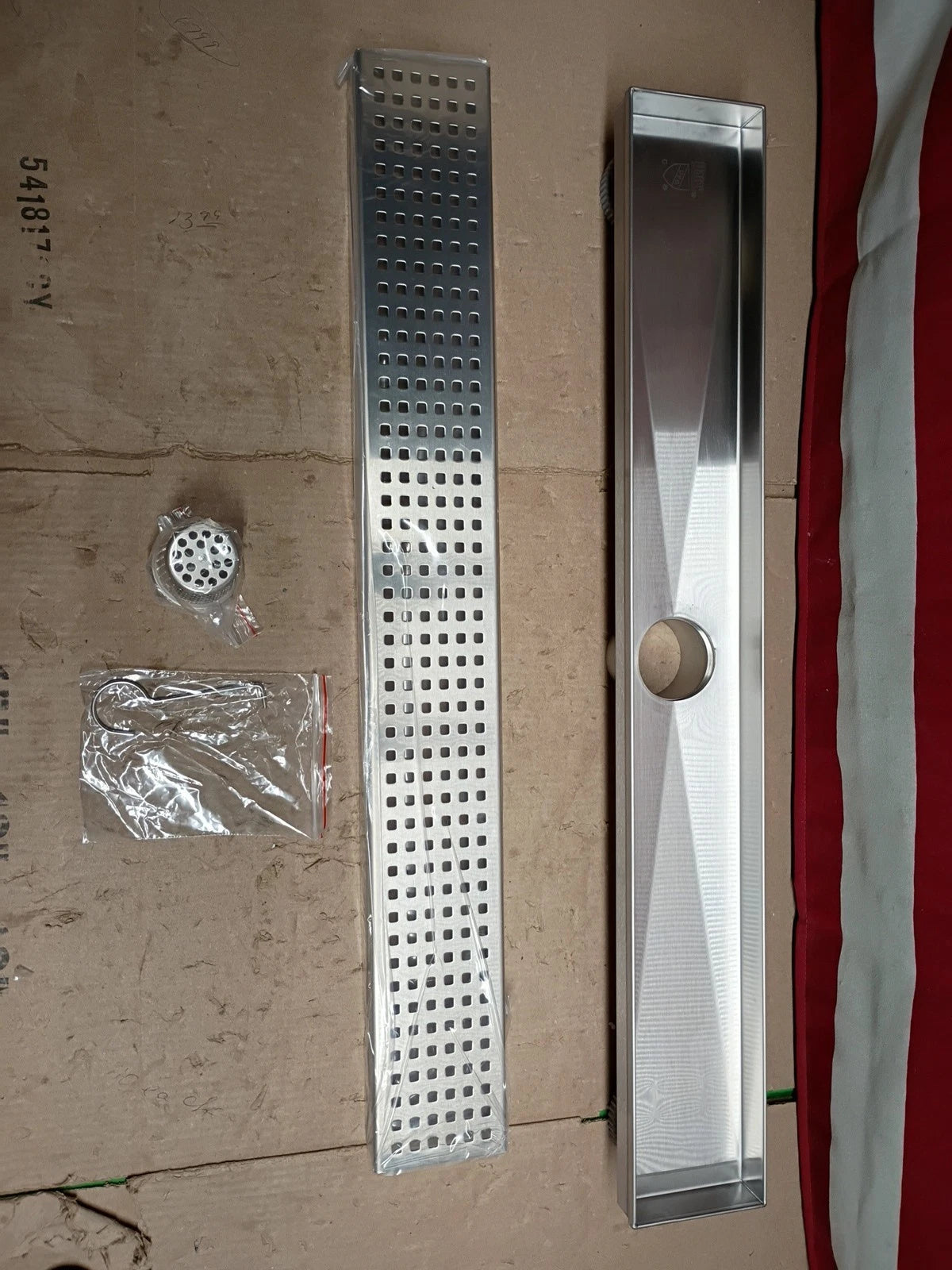 Oatey Designline 24 in Stainless Steel. Linear Shower Drain. with Square Pattern