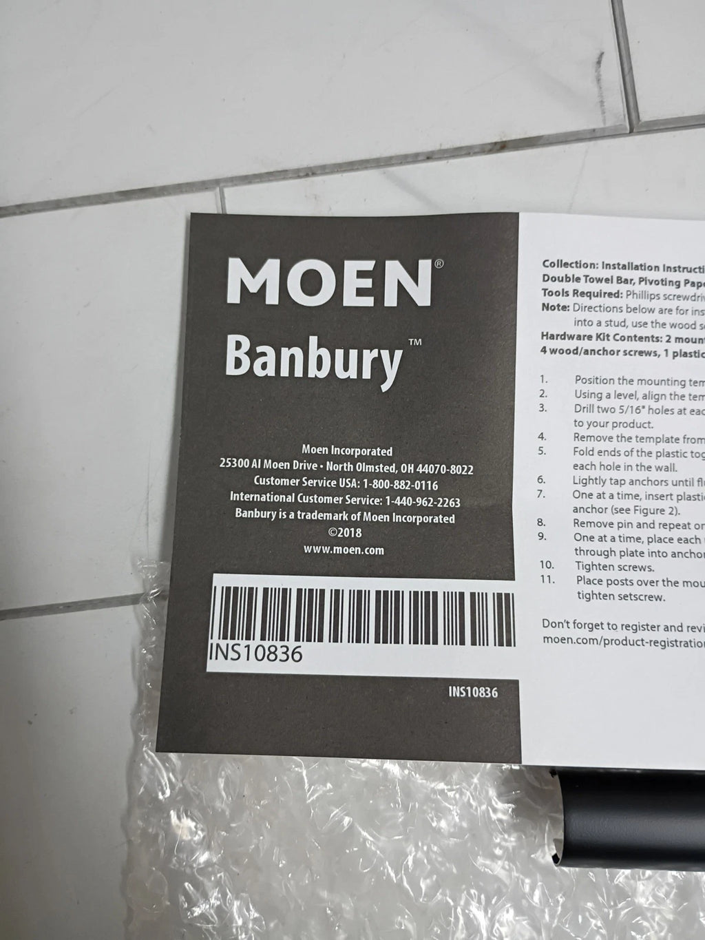 MOEN Y2608BL Banbury Pivoting Double Post Toilet Paper Holder in Matte Black OB