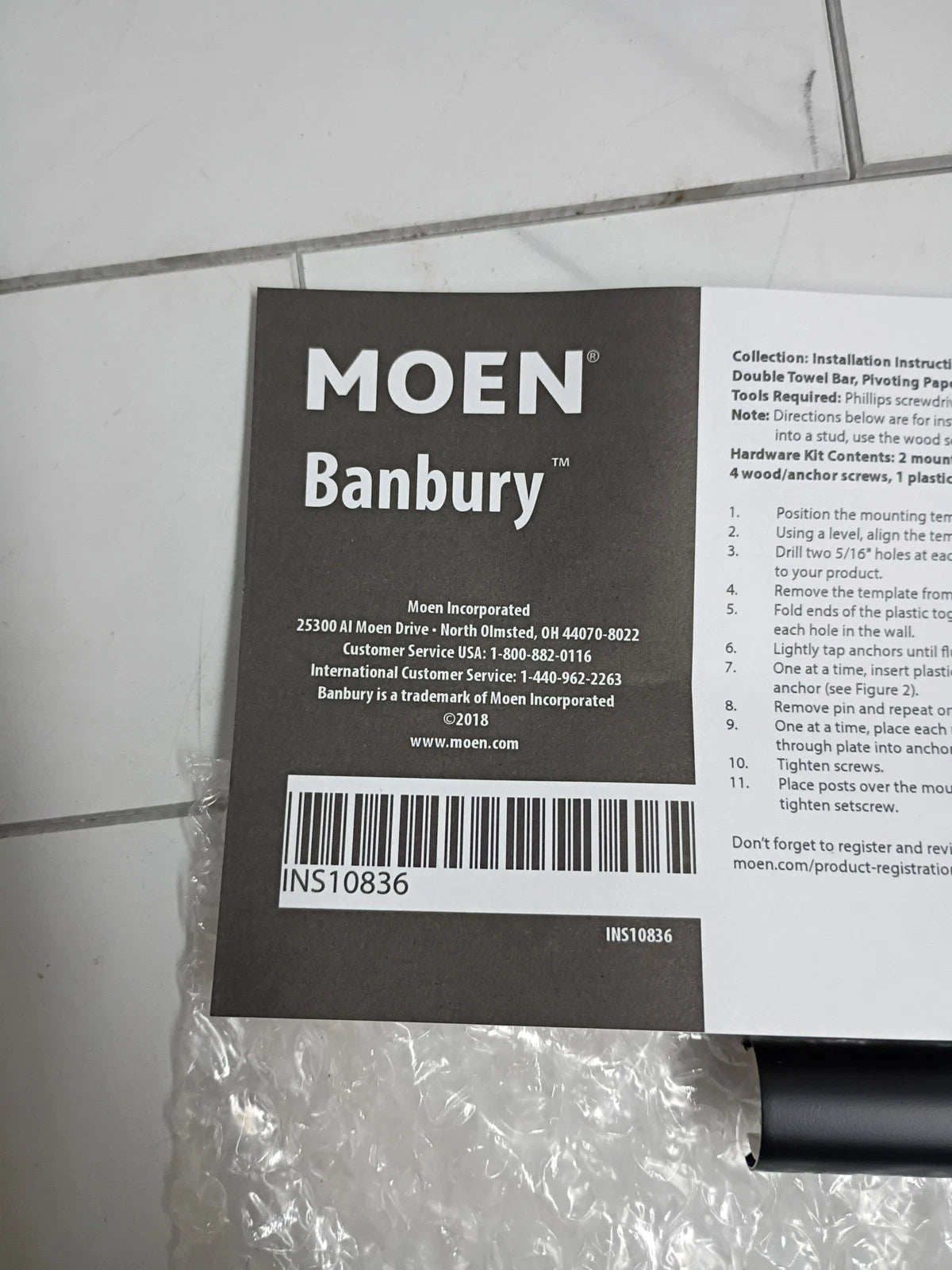 MOEN Y2608BL Banbury Pivoting Double Post Toilet Paper Holder in Matte Black OB