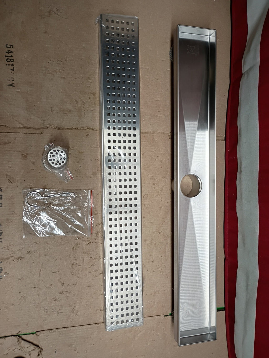Oatey Designline 24 in Stainless Steel. Linear Shower Drain. with Square Pattern