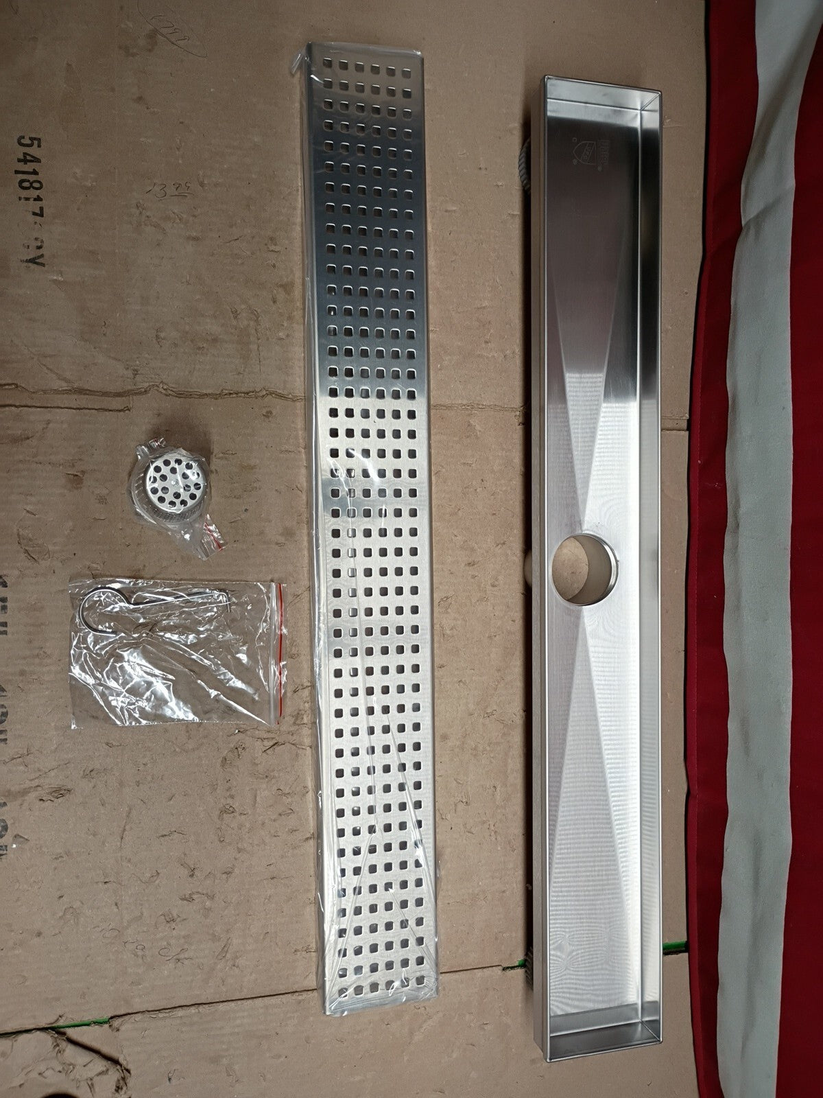 Oatey Designline 24 in Stainless Steel. Linear Shower Drain. with Square Pattern