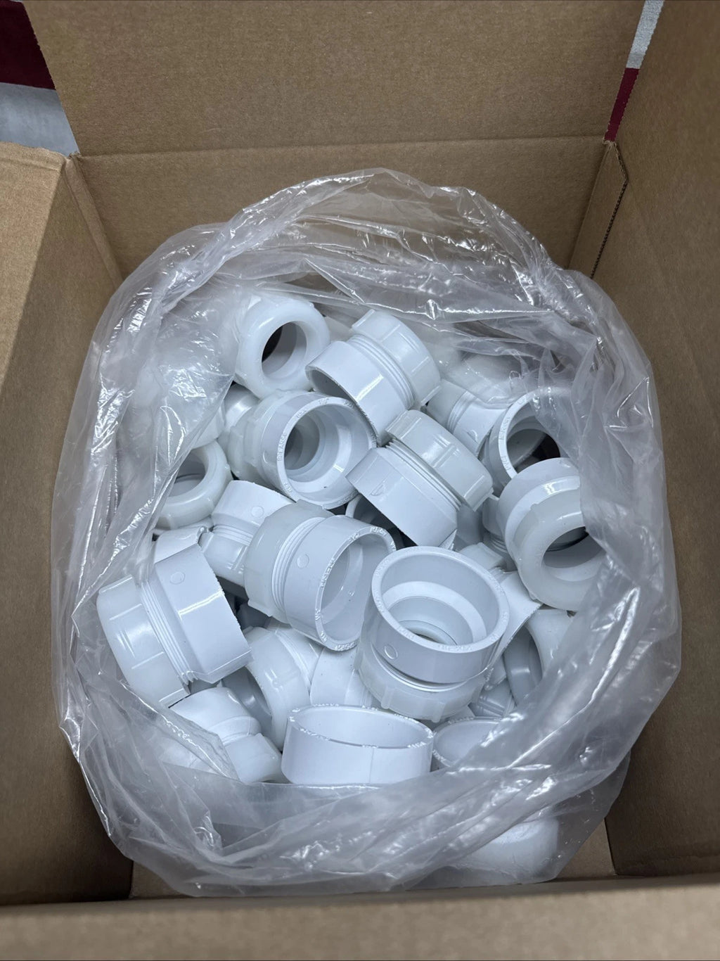 50-PK 1-1/2" x 1-1/4" PVC DWV Female Trap Adapter w/ Nut Socket x Tubular Slip