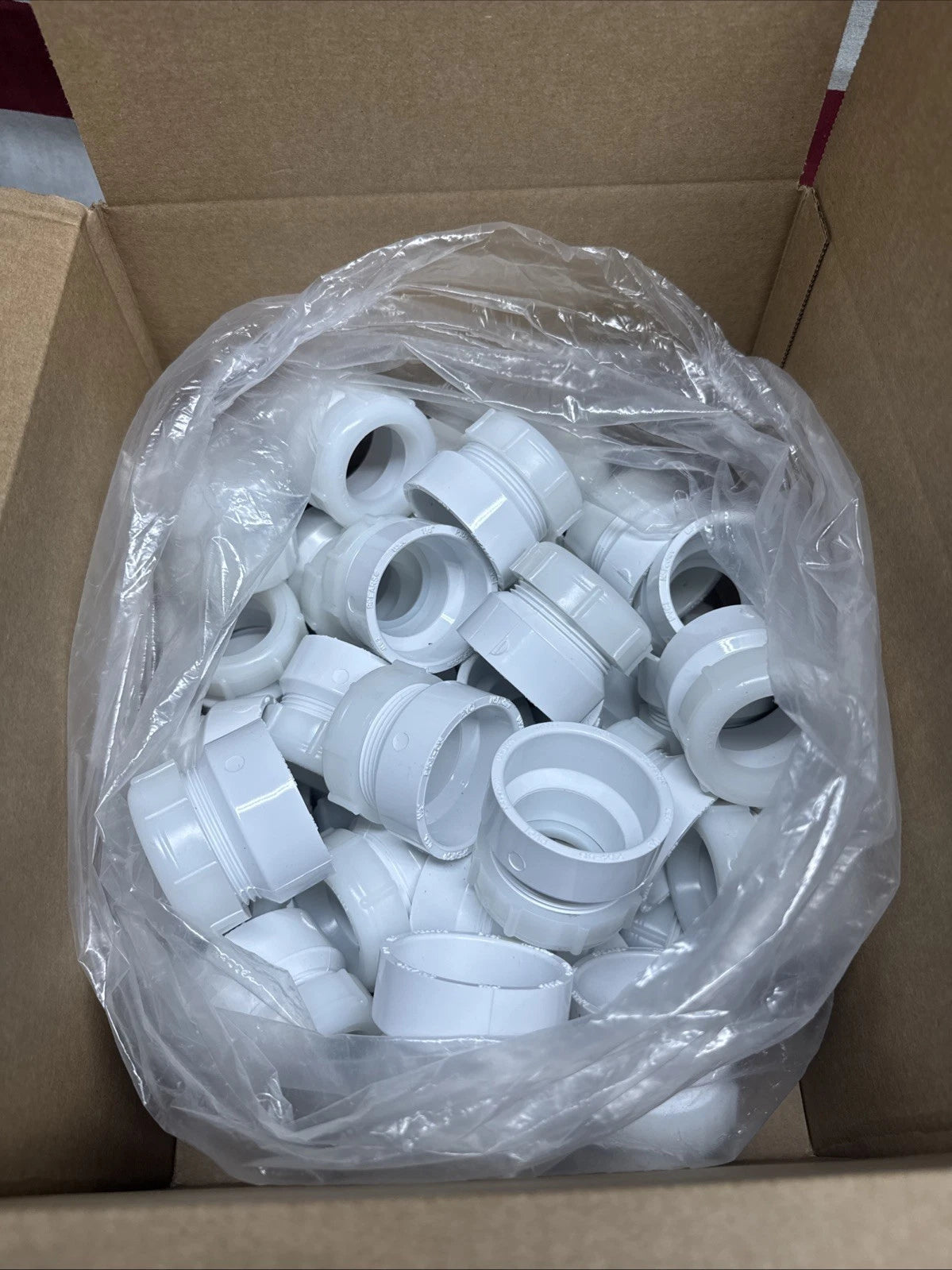 50-PK 1-1/2" x 1-1/4" PVC DWV Female Trap Adapter w/ Nut Socket x Tubular Slip